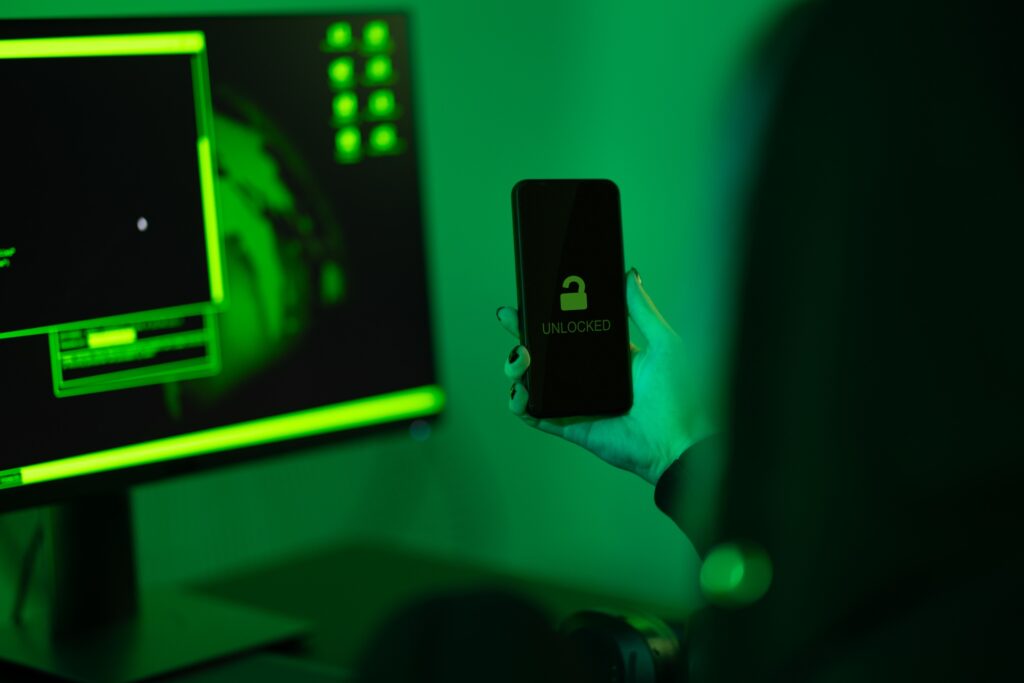 Cyber security concept showing hacker break into mobile phone
